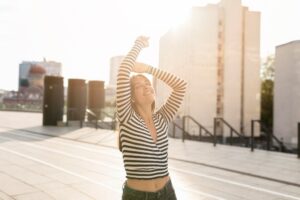 A woman who feels energetic and fit with healthy living tips