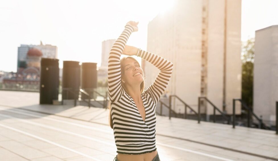 A woman who feels energetic and fit with healthy living tips